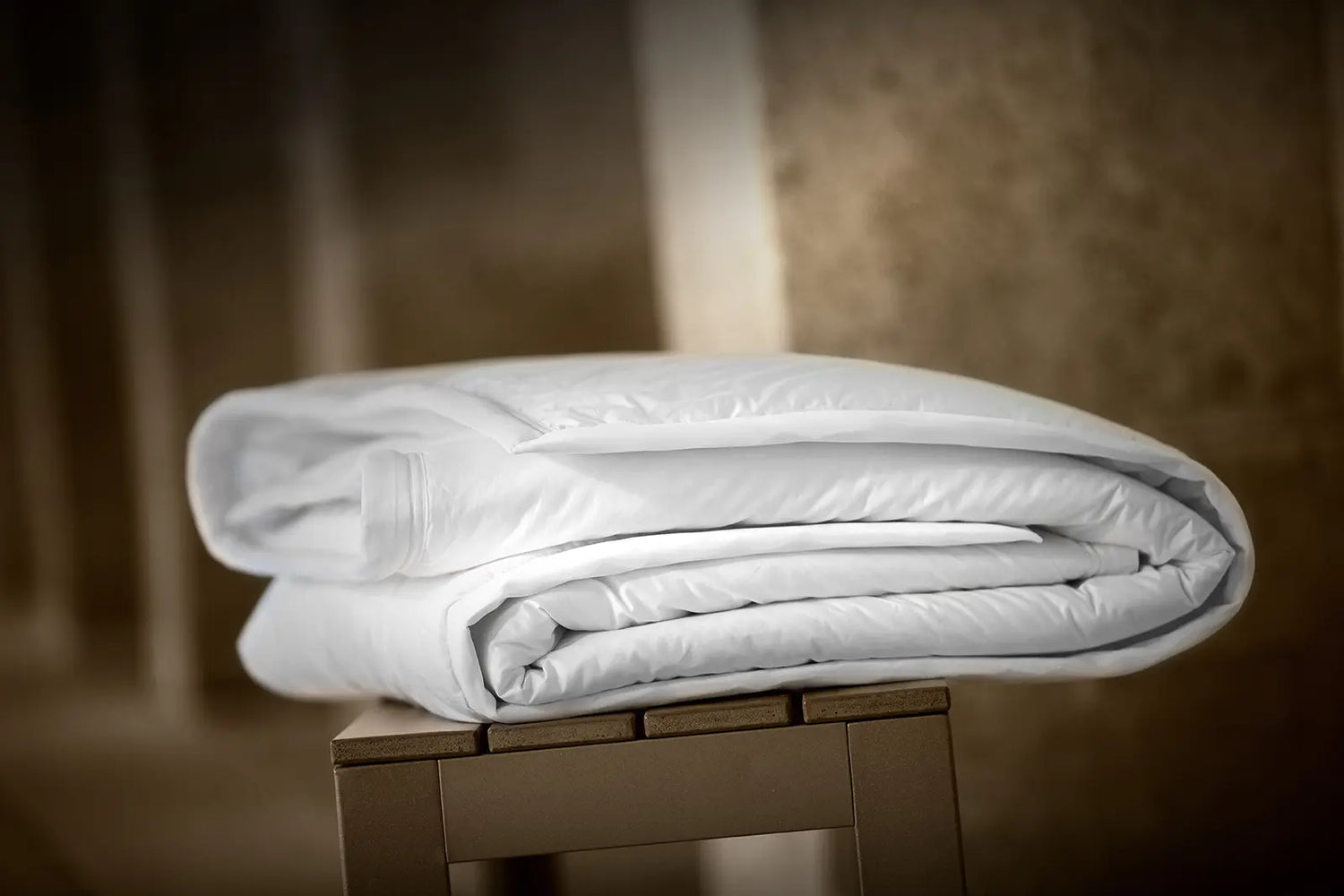 Couverture naturel duvet de canard pliée